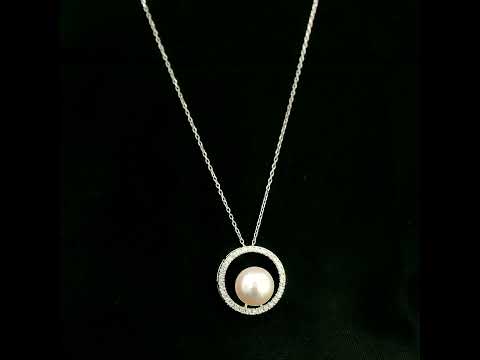 Fresh Water Pearl and diamond pendant necklace with round pearl, open diamond circle and 18K white gold chain.