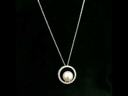 Fresh Water Pearl and diamond pendant necklace with round pearl, open diamond circle and 18K white gold chain.