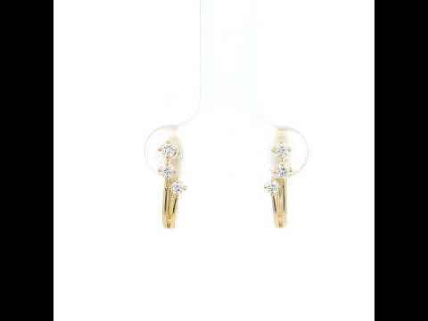 18K Yellow Gold Diamond Hoop Earrings featuring three natural diamonds on each hoop with a modern double-row huggie design.