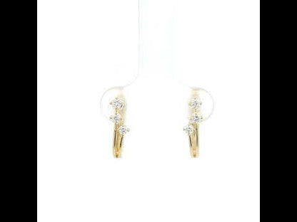 18K Yellow Gold Diamond Hoop Earrings featuring three natural diamonds on each hoop with a modern double-row huggie design.
