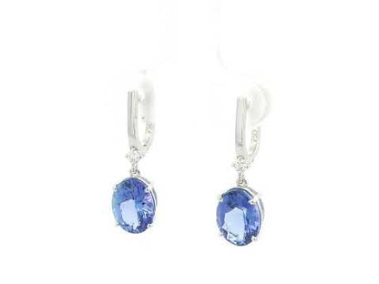 18K white gold tanzanite drop earrings with oval tanzanites and diamond accents