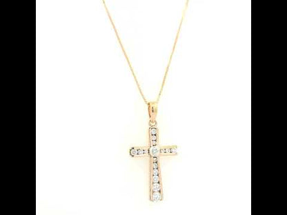 Diamond cross pendant in 18K rose gold with round brilliant diamonds and graduated diamond detailing