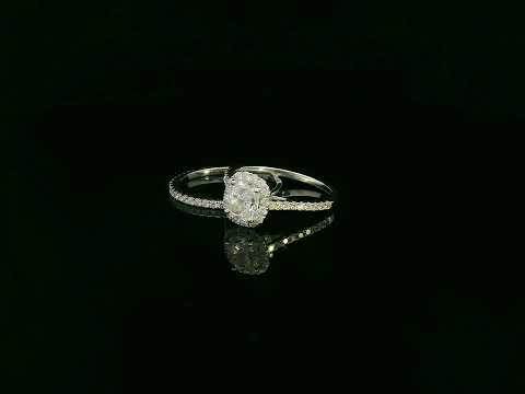 Cushion cut diamond bridal ring set in 18K white gold with diamond wedding band by Emirates Diamonds.