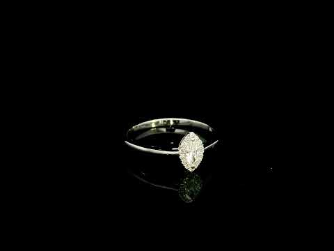 Marquise diamond halo engagement ring in 18K white gold featuring a marquise centre diamond surrounded by a fine round diamond halo.