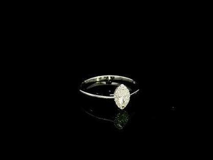 Marquise diamond halo engagement ring in 18K white gold featuring a marquise centre diamond surrounded by a fine round diamond halo.