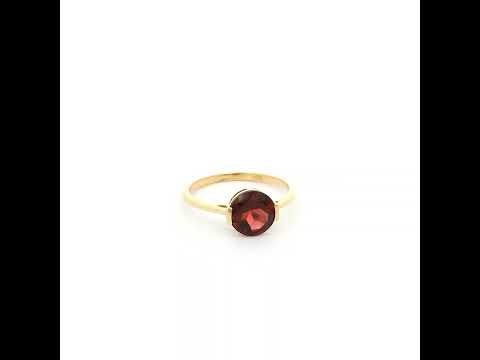 Natural 1.90 carat round garnet solitaire ring in solid 18K yellow gold featuring a contemporary semi-bezel style setting.