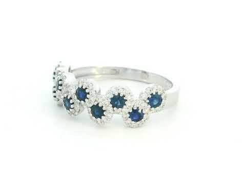 Sapphire and diamond halo ring in 18K gold