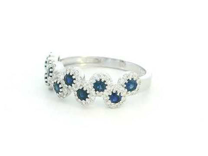 Sapphire and diamond halo ring in 18K gold