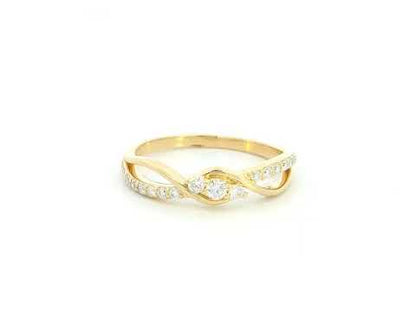 Natural diamond infinity ring in solid 18K yellow gold featuring 0.28 carat round brilliant diamonds in an elegant flowing infinity design.