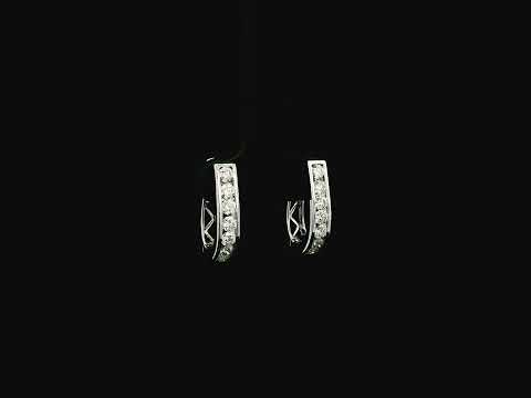 Diamond hoop earrings in 18K white gold featuring 0.98 carats of diamonds by Emirates Diamonds.