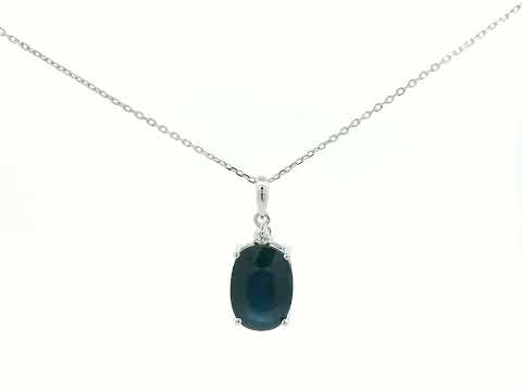 Blue sapphire pendant with diamond connector in prong setting