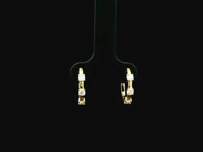 18K yellow gold diamond hoop earrings with round brilliant diamonds totaling 0.36 carat