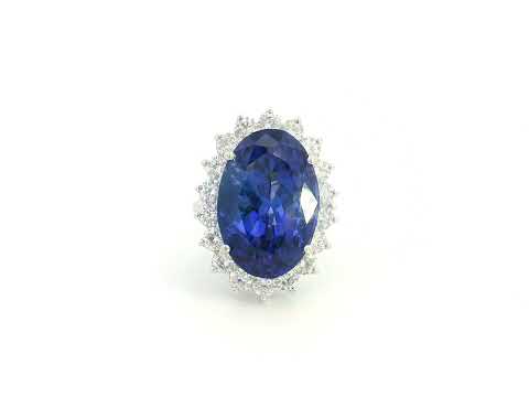 18K white gold oval tanzanite statement ring with diamond halo and 16.11 carat tanzanite by Emirates Diamonds