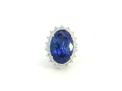 18K white gold oval tanzanite statement ring with diamond halo and 16.11 carat tanzanite by Emirates Diamonds