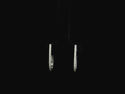 Pavé diamond hoop earrings in 18K white gold with 0.21 carat natural diamonds by Emirates Diamonds.