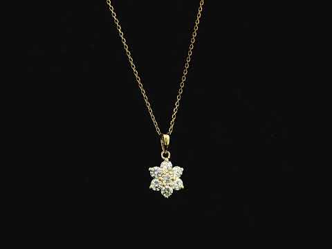 Diamond flower cluster pendant in 18K yellow gold featuring 0.55 carats of diamonds by Emirates Diamonds.