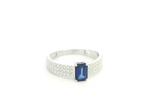 Emerald cut sapphire and diamond ring in 18K white gold
