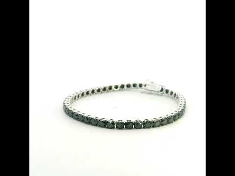 18K white gold black diamond tennis bracelet featuring a continuous row of round natural black diamonds totaling 8.38 carats