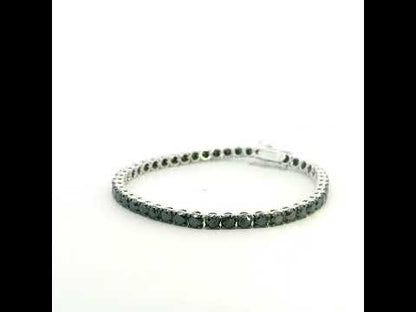 18K white gold black diamond tennis bracelet featuring a continuous row of round natural black diamonds totaling 8.38 carats