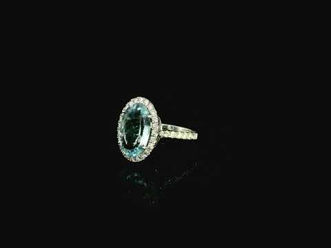 18K white gold aquamarine diamond halo ring 3.80 carat oval aquamarine with diamond halo – Emirates Diamonds