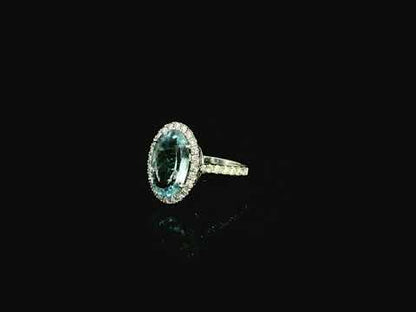 18K white gold aquamarine diamond halo ring 3.80 carat oval aquamarine with diamond halo – Emirates Diamonds