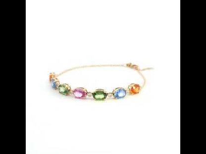 Multi color sapphire and diamond bracelet in 18K rose gold with oval pastel gemstones