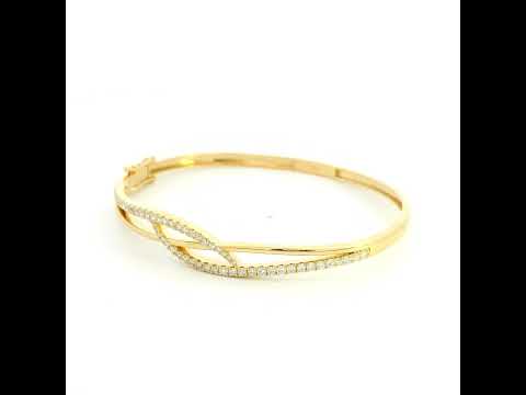 18K yellow gold diamond crossover bangle with 0.80 carat round brilliant natural diamonds and intertwined polished gold design
