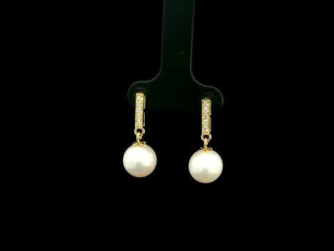 Freshwater pearl and diamond drop earrings in 18K yellow gold with diamond-set bar detail