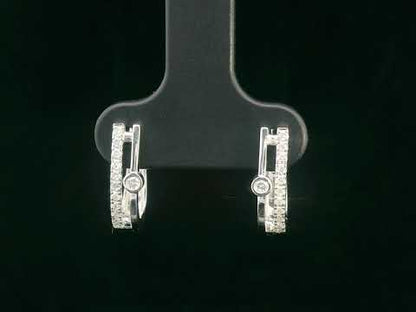 Two-row 18K white gold huggie earrings with pavé and bezel-set diamonds