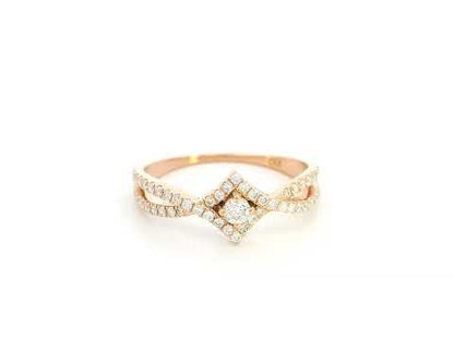 Diamond halo twist ring in 18K rose gold featuring 0.39 carat natural diamonds