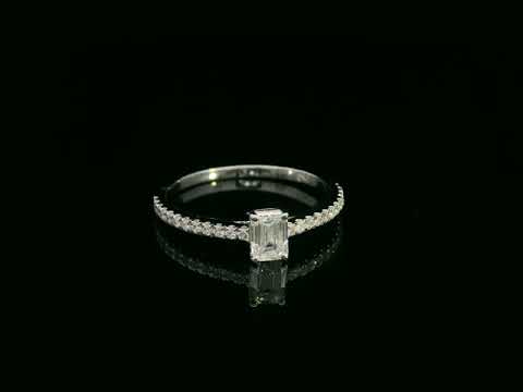 Emerald-cut diamond ring in 18K white gold with pavé band – 0.40ct D/VS1 GIA center stone by Emirates Diamonds.