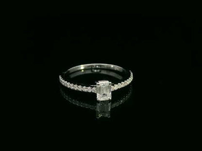 Emerald-cut diamond ring in 18K white gold with pavé band – 0.40ct D/VS1 GIA center stone by Emirates Diamonds.