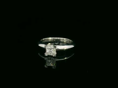 18K white gold solitaire ring with a 0.77ct princess-cut diamond, IGI certified, elegant minimalist engagement design by Emirates Diamonds.