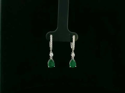 18K white gold emerald and diamond drop earrings with pear-shaped emeralds by Emirates Diamonds