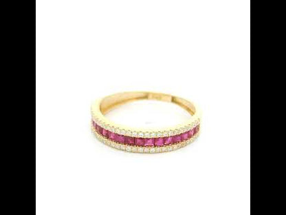 18K yellow gold band ring with a row of square-cut red rubies bordered above and below by small round diamonds.
