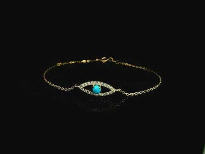 Turquoise evil eye diamond bracelet in 18K yellow gold by Emirates Diamonds