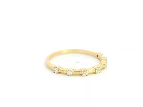 Diamond band ring in 18K yellow gold with round natural diamonds