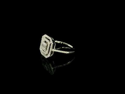 Baguette and round diamond halo ring in 18K white gold