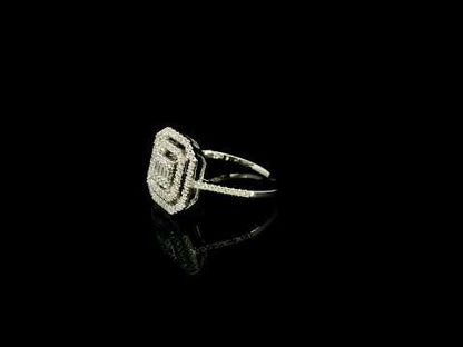 Baguette and round diamond halo ring in 18K white gold