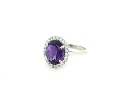 Oval amethyst diamond halo ring in 18K white gold Emirates Diamonds