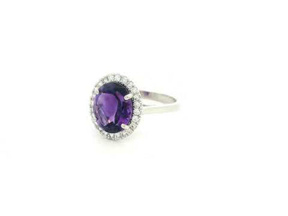 Oval amethyst diamond halo ring in 18K white gold Emirates Diamonds