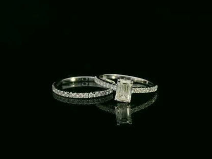 18K white gold emerald-cut diamond bridal ring set with pavé diamond band – 0.90ct center stone, luxury fine jewelry by Emirates Diamonds.