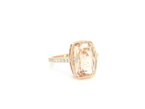 Emerald cut Morganite bezel set ring in 18K rose gold with diamond pavé band