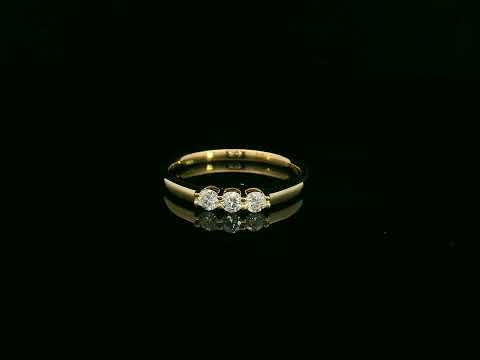 18K yellow gold diamond three-stone ring with round brilliant diamonds, classic trilogy ring design by Emirates Diamonds