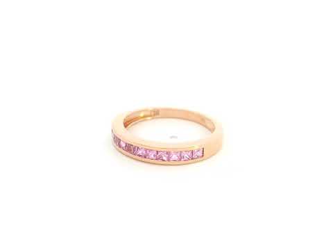 Pink sapphire channel set ring in 18K rose gold princess cut band