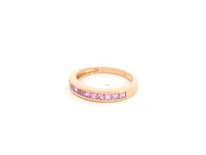 Pink sapphire channel set ring in 18K rose gold princess cut band