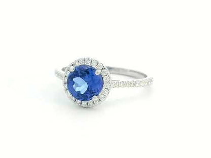 Elegant 1.55-carat round Tanzanite and diamond halo ring in 18K gold – luxury gemstone jewelry