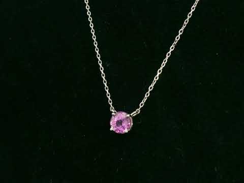 18K white gold pink sapphire solitaire necklace featuring a 0.61 carat round pink sapphire pendant by Emirates Diamonds