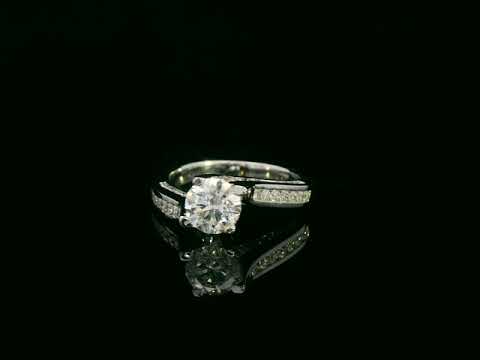 18K white gold engagement ring with 1.01ct round diamond center and diamond split-shank design – Emirates Diamonds
