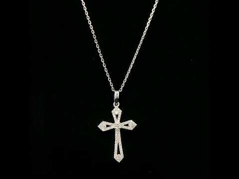 Diamond cross pendant in 18K white gold with round diamonds, an openwork design and distinctive pointed ends.
